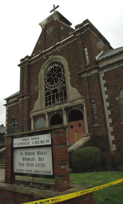 The sign in front of St. Anne Church in New Castle read “To remove worry wrinkles, get your faith lifted” on the morning of the Holy Saturday, April 7, fire that gutted the 83-year-old Henry County landmark. William L. Abbott of New Castle has been charged with arson.