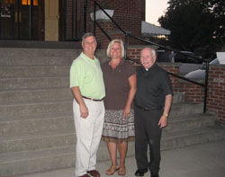 Steve Hauswald, left, his wife, Diane, and Father Daniel Atkins stand outside Most Precious Blood Church in New Middletown on Sept. 23. The Hauswalds serve as Legacy for Our Mission: For Our Children and the Future campaign coordinators for St. Joseph Parish in Corydon, St. Peter Parish in Harrison County and Most Precious Blood Parish, the three parishes where Father Atkins serves as pastor. (Submitted photo) 