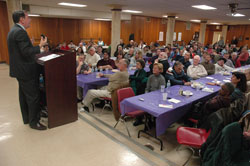 Robert Royal, president of the Washington-based Faith and Reason Institute and graduate dean of the Catholic Distance University, speaks to approximately 180 people on Feb. 27 at Our Lady of the Most Holy Rosary Parish in Indianapolis during its Lenten “Spaghetti and Spirituality” series. Royal emphasized to his audience that it is the special role of the Catholic laity to “take Catholic principles and to see that they permeate … free societies.” (Photo by Sean Gallagher) 