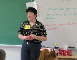 From the thrill of roller coasters to her joy about following a religious vocation, Benedictine Sister Rebecca Ann Mathauer talked to students at St. Barnabas Parish in Indianapolis, where her love for God was nurtured. (Photo by John Shaughnessy) 