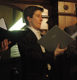 Patrick Valentino, who is the music director of St. Margaret Mary Parish in Westwood, Mass., sings during the March 2 liturgy. (Photo by John Shaughnessy)