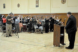 Cardinal-designate Joseph W. Tobin receives a standing ovation from archdiocesan staff at the Archbishop Edward T. O’Meara Catholic Center in Indianapolis on Oct. 10 at the beginning of a press conference. During the gathering, which included members of the secular media, Cardinal-designate Tobin discussed being named a cardinal the day before by Pope Francis. (Photo by Sean Gallagher )