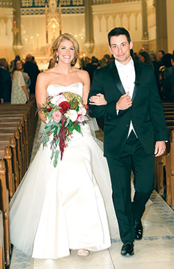 Kayci and Matt Mikrut process out of St. John the Evangelist Church in Indianapolis after their wedding on Oct. 21, 2017. The couple wanted to be married in the church where their Catholic faith blossomed. (Photo provided courtesy of Jessica Strickland Photography)