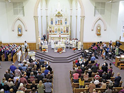 Archbishop Charles C. Thompson and several concelebrating priests pray the eucharistic prayer during an Oct. 28 Mass at St. Louis Church in Batesville to celebrate the 150th anniversary of the founding of St. Louis Parish. (Submitted photo)