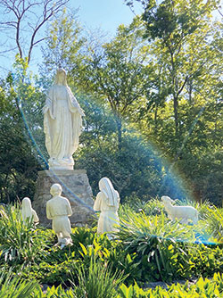 A lens flare projects an interesting perspective on the shrine of Our Lady of Fatima at Our Lady of Fatima Retreat House in Indianapolis on May 13. (Submitted photo by Victoria Arthur)