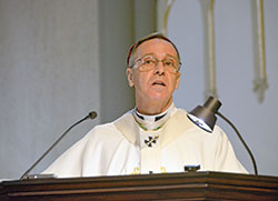 Archbishop Charles C. Thompson delivers a homily on Jan. 24 at St. John the Evangelist Church in Indianapolis on Jan. 24. (Photo by Natalie Hoefer)