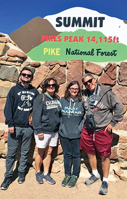 During a vacation in Colorado in 2019, the archdiocese’s assistant superintendent of Catholic schools, Rob Rash, right, and his wife Patty, second from left, pose for a family picture with their son John and their daughter Katie. (Submitted photo)