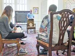 In this photo from 2015, counselor Andy Martin leads an afternoon group session at GraceWay home in Albany, Ga., a home for women working to overcome addiction. (CNS photo/Michael Alexander, Georgia Bulletin)