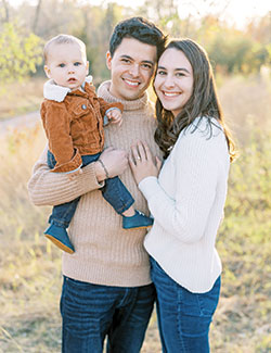 Aaron and Ava Pfeiffer, members of Our Lady of the Most Holy Rosary Parish in Indianapolis, pose with their 1-year-old son Ezra. (Submitted photo)