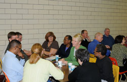 Table discussions take place during a Town Hall meeting at Mater Dei High School in Evansville, Oct. 26. (Message photo by Paul R. Leingang)