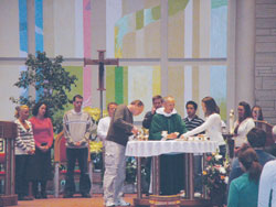 Dominican Father Robert Keller celebrates Mass at St. Paul Catholic Center with students from Indiana University in Bloomington. Father Bob estimates that 2,000 students attend Mass at St. Paul Catholic Center each weekend. (Submitted photo)